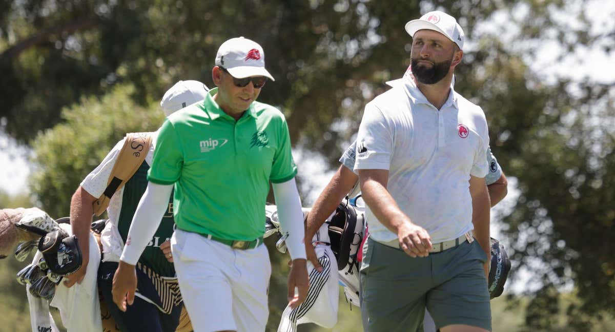 Rahm y Sergio García, durante su vuelta. /EFE